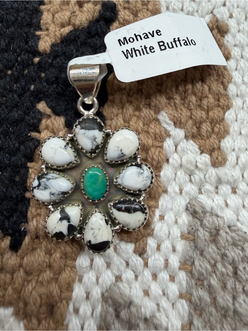 White buffalo with Mojave turquoise sterling silver pendant